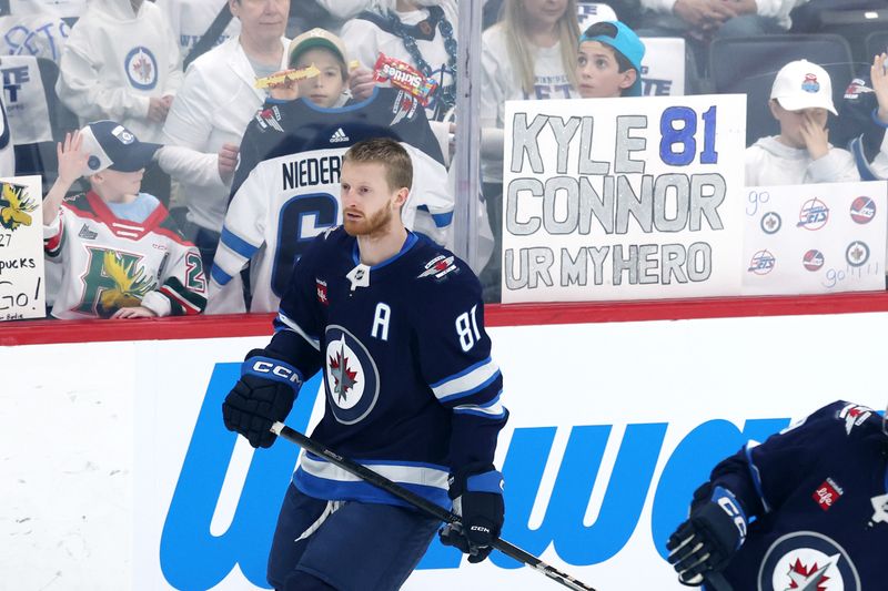 May 4, 2025; Winnipeg, Manitoba, CAN; Winnipeg Jets left wing Kyle Connor (81) warms up before a game against the St. Louis Blues in game seven of the first round of the 2025 Stanley Cup Playoffs at Canada Life Centre. Mandatory Credit: James Carey Lauder-Imagn Images