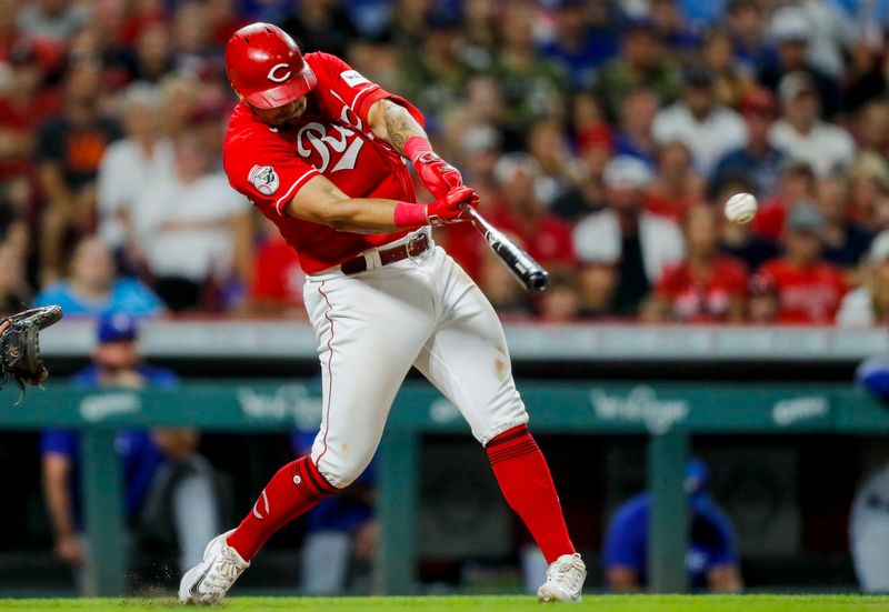 Aug 19, 2023; Cincinnati, Ohio, USA; Cincinnati Reds designated hitter Christian Encarnacion-Strand (33) hits a single against the Toronto Blue Jays in the ninth inning at Great American Ball Park. Mandatory Credit: Katie Stratman-USA TODAY Sports