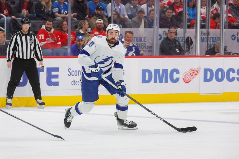 Jan 21, 2024; Detroit, Michigan, USA; Tampa Bay Lightning left wing Nicholas Paul (20) handles the puck during the first period at Little Caesars Arena. Mandatory Credit: Brian Bradshaw Sevald-USA TODAY Sports