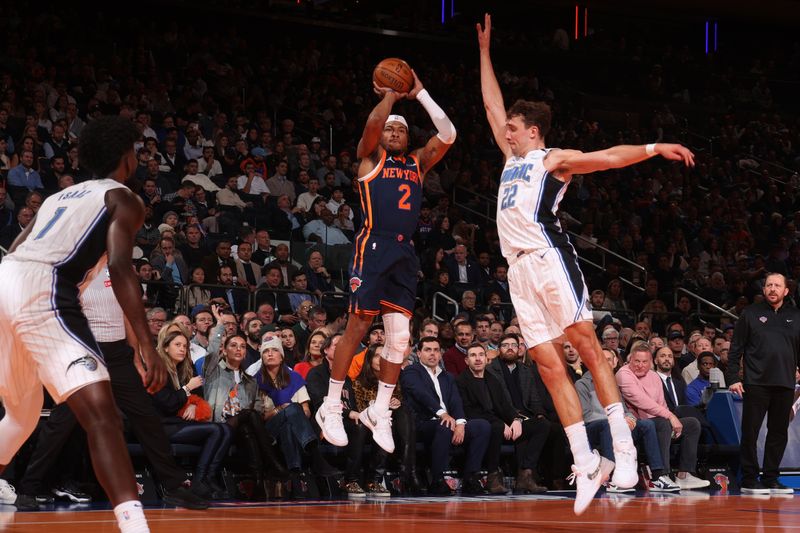 NEW YORK, NY - DECEMBER 3: Miles McBride #2 of the New York Knicks shoots a three point basket during the game  against the Orlando Magic during the Emirates NBA Cup on December 3, 2024 at Madison Square Garden in New York City, New York.  NOTE TO USER: User expressly acknowledges and agrees that, by downloading and or using this photograph, User is consenting to the terms and conditions of the Getty Images License Agreement. Mandatory Copyright Notice: Copyright 2024 NBAE  (Photo by Nathaniel S. Butler/NBAE via Getty Images)