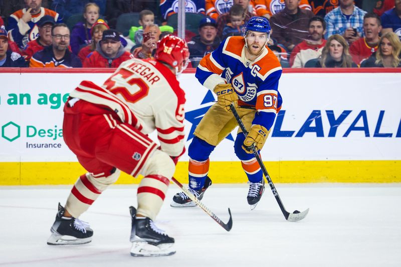 Jan 20, 2024; Calgary, Alberta, CAN; Edmonton Oilers center Connor McDavid (97) controls the puck against the Calgary Flames during the first period at Scotiabank Saddledome. Mandatory Credit: Sergei Belski-USA TODAY Sports