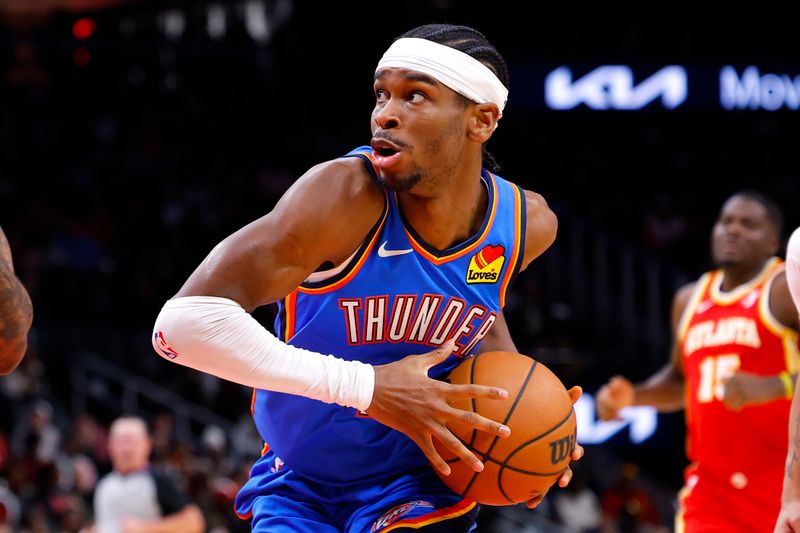 ATLANTA, GEORGIA - JANUARY 3: Shai Gilgeous-Alexander #2 of the Oklahoma City Thunder drives to the basket during the second quarter against the Atlanta Hawks at State Farm Arena on January 3, 2024 in Atlanta, Georgia. NOTE TO USER: User expressly acknowledges and agrees that, by downloading and or using this photograph, User is consenting to the terms and conditions of the Getty Images License Agreement. (Photo by Todd Kirkland/Getty Images)