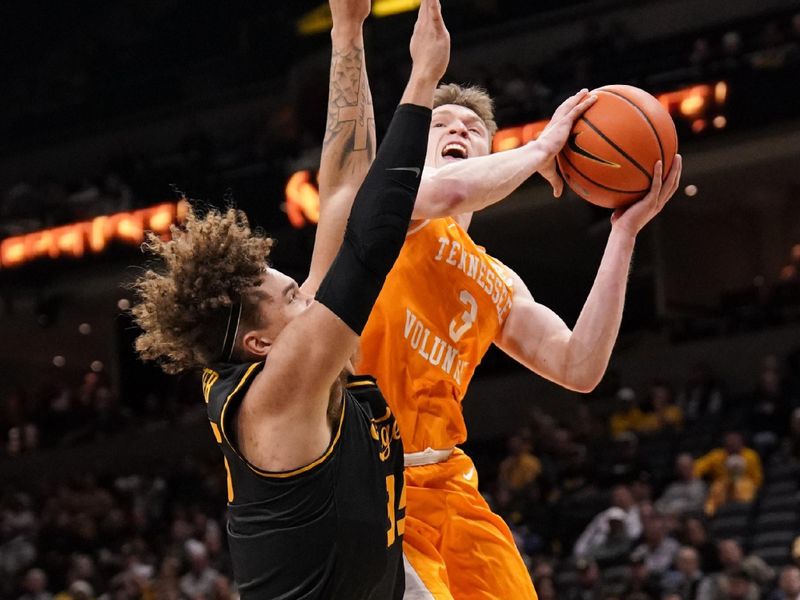 Feb 20, 2024; Columbia, Missouri, USA; Tennessee Volunteers guard Dalton Knecht (3) shoots as Missouri Tigers forward Noah Carter (35) defends  during the second half at Mizzou Arena. Mandatory Credit: Denny Medley-USA TODAY Sports