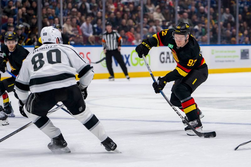 Mar 25, 2024; Vancouver, British Columbia, CAN; Vancouver Canucks forward Vasily Podkolzin (92) shoots against the Los Angeles Kings in the first period at Rogers Arena. Mandatory Credit: Bob Frid-USA TODAY Sports