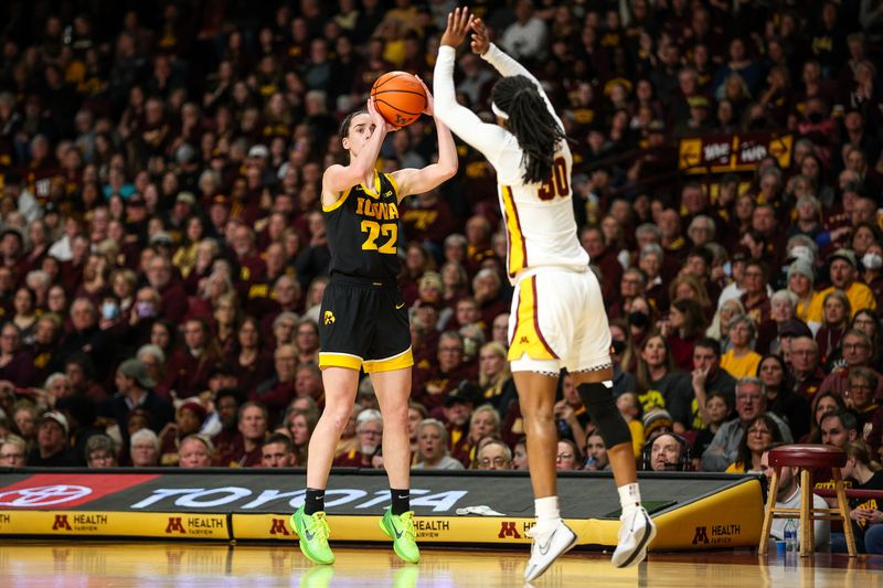 Feb 28, 2024; Minneapolis, Minnesota, USA; Iowa Hawkeyes guard Caitlin Clark (22) shoots as Minnesota Golden Gophers guard Janay Sanders (30) defends during the second half at Williams Arena. Mandatory Credit: Matt Krohn-USA TODAY Sports