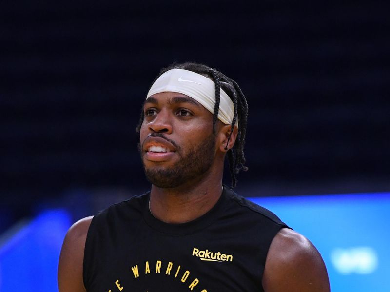 SAN FRANCISCO, CA - DECEMBER 5: Buddy Hield #7 of the Golden State Warriors smiles before the game against the Houston Rockets on December 5, 2024 at Chase Center in San Francisco, California. NOTE TO USER: User expressly acknowledges and agrees that, by downloading and or using this photograph, user is consenting to the terms and conditions of Getty Images License Agreement. Mandatory Copyright Notice: Copyright 2024 NBAE (Photo by Noah Graham/NBAE via Getty Images)