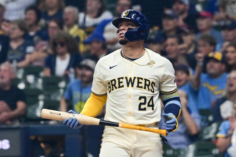 Aug 15, 2024; Milwaukee, Wisconsin, USA; Milwaukee Brewers catcher William Contreras (24) watches after hitting a solo home run against the Los Angeles Dodgers in the first inning at American Family Field. Mandatory Credit: Benny Sieu-USA TODAY Sports