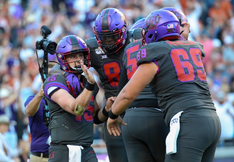 Oct 26, 2019; Fort Worth, TX, USA; TCU Horned Frogs quarterback Max Duggan (15) celebrates with teammates after scoring a touchdown during the fourth quarter against the Texas Longhorns at Amon G. Carter Stadium. Mandatory Credit: Kevin Jairaj-USA TODAY Sports