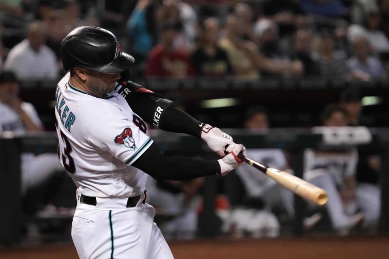 Apr 25, 2023; Phoenix, Arizona, USA; Arizona Diamondbacks first baseman Christian Walker (53) hits an RBI groundout against the Kansas City Royals during the fourth inning at Chase Field. Mandatory Credit: Joe Camporeale-USA TODAY Sports