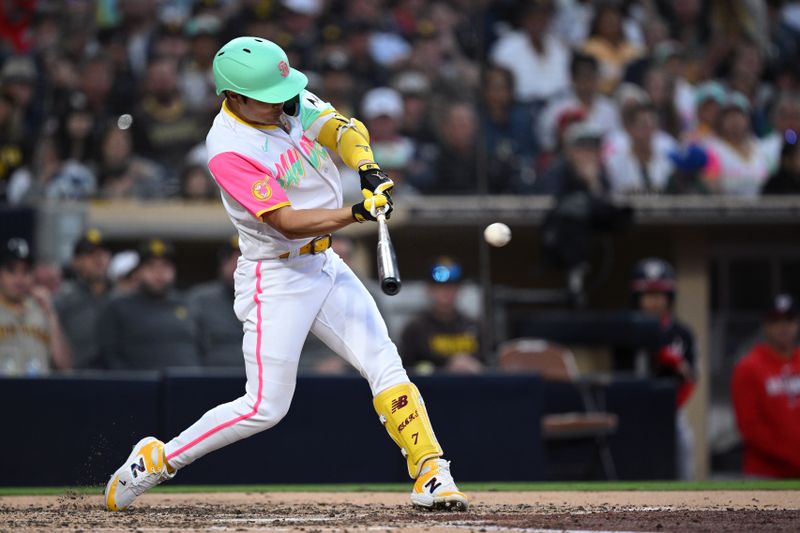 Jun 23, 2023; San Diego, California, USA; San Diego Padres second baseman Ha-seong Kim (7) hits a two-RBI  single against the Washington Nationals during the fifth inning at Petco Park. Mandatory Credit: Orlando Ramirez-USA TODAY Sports