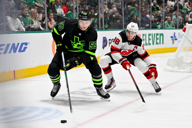 Mar 14, 2024; Dallas, Texas, USA; Dallas Stars defenseman Thomas Harley (55) and New Jersey Devils center Jack Hughes (86) chase the puck during the first period at the American Airlines Center. Mandatory Credit: Jerome Miron-USA TODAY Sports