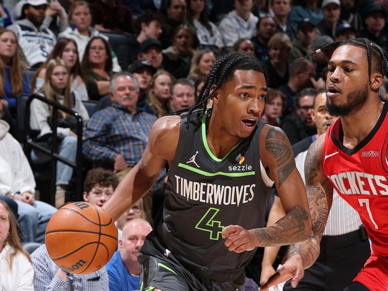 MINNEAPOLIS, MN - FEBRUARY 6: Rob Dillingham #4 of the Minnesota Timberwolves handles the ball during the game against the Houston Rockets on February 6, 2025 at Target Center in Minneapolis, Minnesota. NOTE TO USER: User expressly acknowledges and agrees that, by downloading and or using this Photograph, user is consenting to the terms and conditions of the Getty Images License Agreement. Mandatory Copyright Notice: Copyright 2025 NBAE(Photo by David Sherman/NBAE via Getty Images)