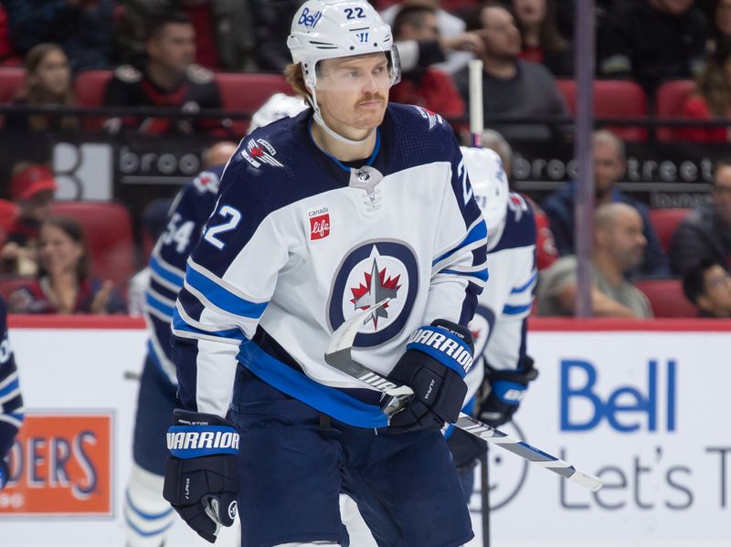 Jan 20, 2024; Ottawa, Ontario, CAN; Winnipeg Jets center Mason Appleton (22) skates to the bench after scoring a  goal scored in the second period against the Ottawa Senators at the Canadian Tire Centre. Mandatory Credit: Marc DesRosiers-USA TODAY Sports