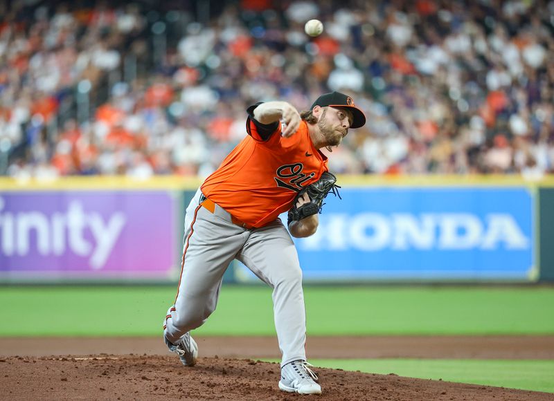 Jun 22, 2024; Houston, Texas, USA; Baltimore Orioles starting pitcher Corbin Burnes (39) delivers a pitch during the second inning against the Houston Astros at Minute Maid Park. Mandatory Credit: Troy Taormina-USA TODAY Sports