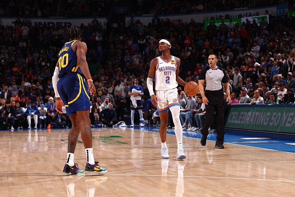 OKLAHOMA CITY, OK - DECEMBER 8: Shai Gilgeous-Alexander #2 of the Oklahoma City Thunder dribbles the ball during the game against the Golden State Warriors on December 8, 2023 at Paycom Arena in Oklahoma City, Oklahoma. NOTE TO USER: User expressly acknowledges and agrees that, by downloading and or using this photograph, User is consenting to the terms and conditions of the Getty Images License Agreement. Mandatory Copyright Notice: Copyright 2023 NBAE (Photo by Zach Beeker/NBAE via Getty Images)