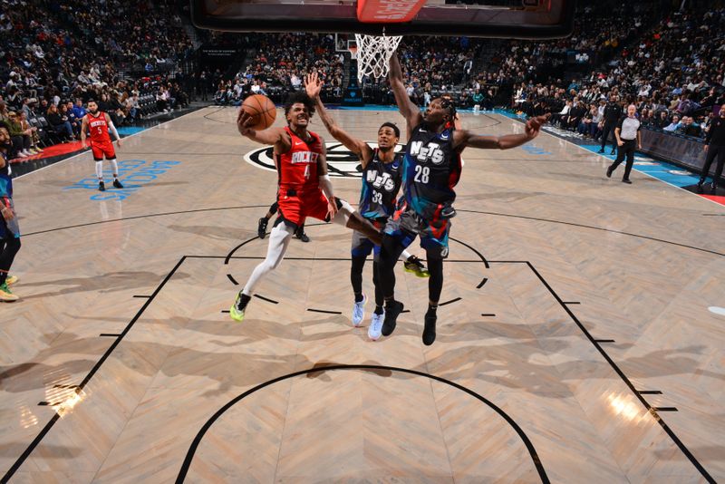 BROOKLYN, NY - JANUARY 27: Jalen Green #4 of the Houston Rockets drives to the basket during the game against the Brooklyn Nets on January 27, 2024 at Barclays Center in Brooklyn, New York. NOTE TO USER: User expressly acknowledges and agrees that, by downloading and or using this Photograph, user is consenting to the terms and conditions of the Getty Images License Agreement. Mandatory Copyright Notice: Copyright 2024 NBAE (Photo by Jesse D. Garrabrant/NBAE via Getty Images)