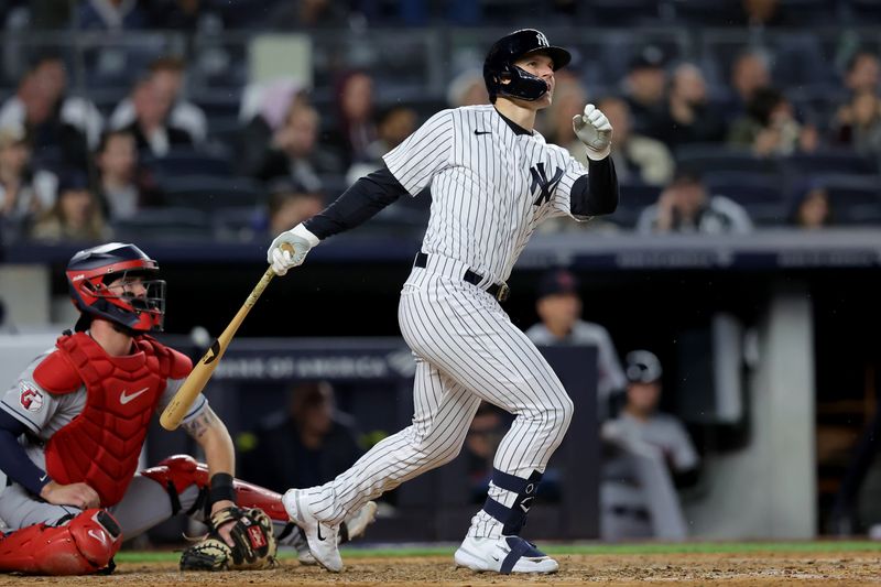 May 3, 2023; Bronx, New York, USA; New York Yankees right fielder Jake Bauers (61) follows through on a solo home run against the Cleveland Guardians during the fifth inning at Yankee Stadium. Mandatory Credit: Brad Penner-USA TODAY Sports