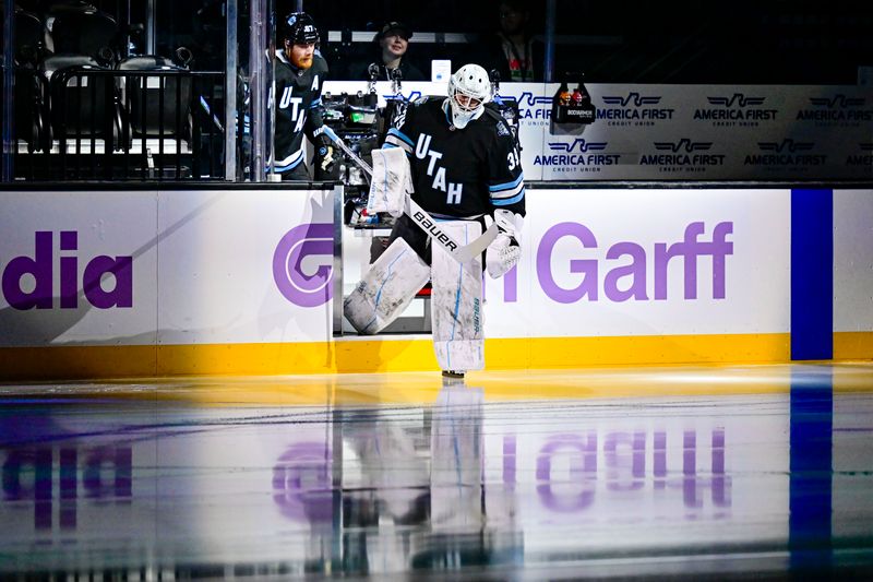 Jan 18, 2025; Salt Lake City, Utah, USA; Utah Hockey Club goalie Connor Ingram (39) skates on the ice against the St. Louis Blues during first period at the Delta Center. Mandatory Credit: Christopher Creveling-Imagn Images