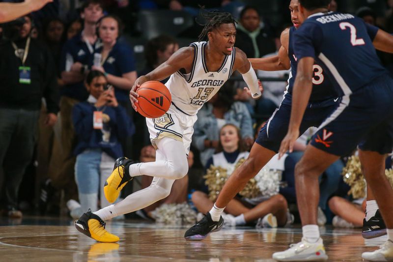 Jan 20, 2024; Atlanta, Georgia, USA; Georgia Tech Yellow Jackets guard Miles Kelly (13) drives to the basket against the Virginia Cavaliers in the first half at McCamish Pavilion. Mandatory Credit: Brett Davis-USA TODAY Sports
