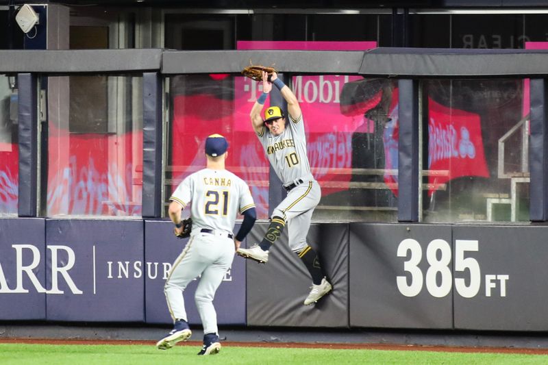 Sep 8, 2023; Bronx, New York, USA;  Milwaukee Brewers center fielder Sal Frelick (10) makes a leaping catch before crashing into the wall in the second inning against the New York Yankees at Yankee Stadium. Mandatory Credit: Wendell Cruz-USA TODAY Sports