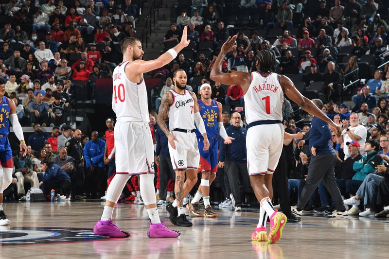 INGLEWOOD, CA - DECEMBER 1: Ivica Zubac #40 and James Harden #1 of the LA Clippers high five during the game against the Denver Nuggets on December 1, 2024 at Intuit Dome in Los Angeles, California. NOTE TO USER: User expressly acknowledges and agrees that, by downloading and/or using this Photograph, user is consenting to the terms and conditions of the Getty Images License Agreement. Mandatory Copyright Notice: Copyright 2024 NBAE (Photo by Juan Ocampo/NBAE via Getty Images)