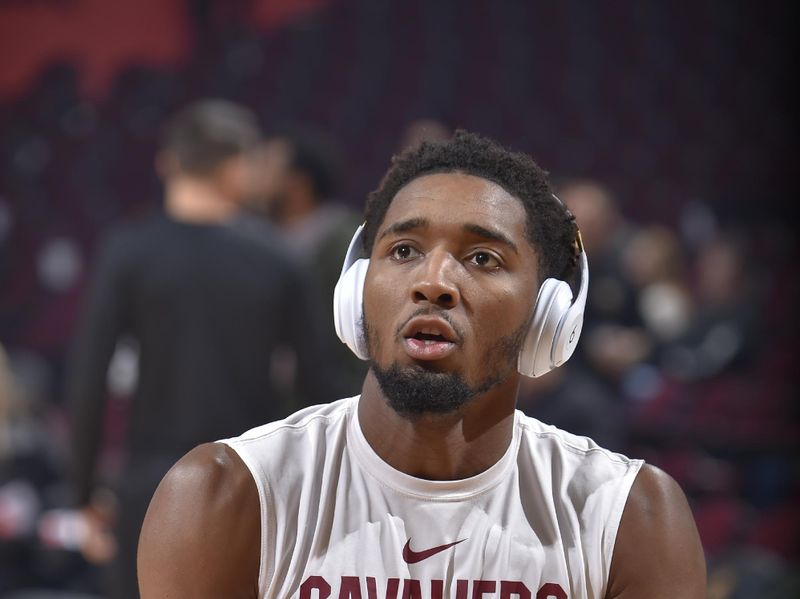 CLEVELAND, OH - NOVEMBER 20: Donovan Mitchell #45 of the Cleveland Cavaliers warms up before the game against the Miami Heat on November 20, 2022 at Rocket Mortgage FieldHouse in Cleveland, Ohio. NOTE TO USER: User expressly acknowledges and agrees that, by downloading and/or using this Photograph, user is consenting to the terms and conditions of the Getty Images License Agreement. Mandatory Copyright Notice: Copyright 2022 NBAE (Photo by David Liam Kyle/NBAE via Getty Images)