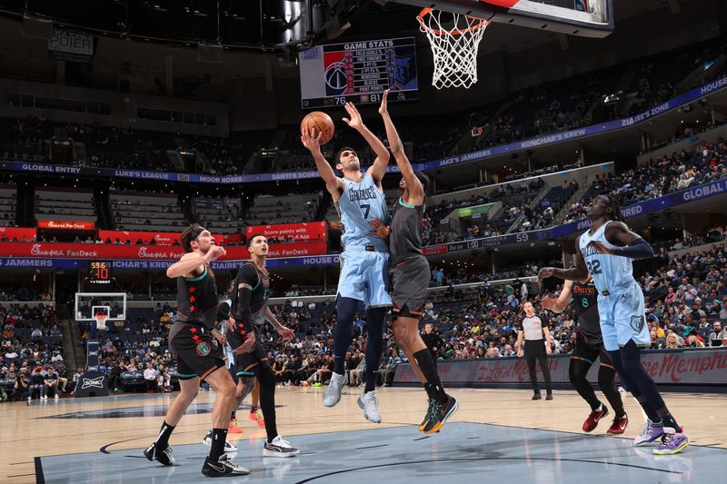 MEMPHIS, TN - MARCH 12: Santi Aldama #7 of the Memphis Grizzlies shoots the ball during the game against the Washington Wizards on March 12, 2024 at FedExForum in Memphis, Tennessee. NOTE TO USER: User expressly acknowledges and agrees that, by downloading and or using this photograph, User is consenting to the terms and conditions of the Getty Images License Agreement. Mandatory Copyright Notice: Copyright 2024 NBAE (Photo by Joe Murphy/NBAE via Getty Images)