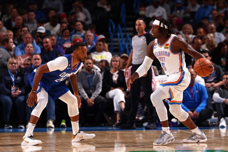 OKLAHOMA CITY, OK - OCTOBER 25: Luguentz Dort #5 of the Oklahoma City Thunder handles the ball during the game against the LA Clippers on October 25, 2022 at Paycom Arena in Oklahoma City, Oklahoma. NOTE TO USER: User expressly acknowledges and agrees that, by downloading and or using this photograph, User is consenting to the terms and conditions of the Getty Images License Agreement. Mandatory Copyright Notice: Copyright 2022 NBAE (Photo by Zach Beeker/NBAE via Getty Images)