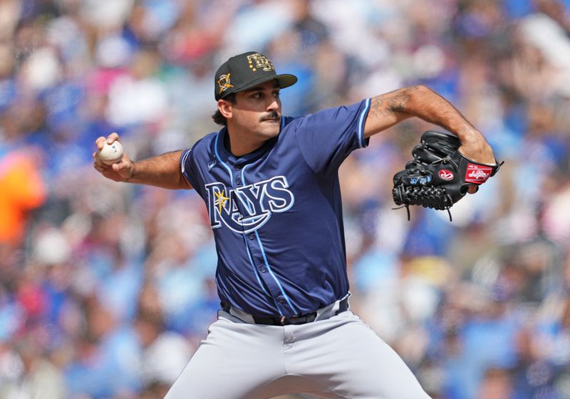 May 18, 2024; Toronto, Ontario, CAN; Tampa Bay Rays starting pitcher Zach Eflin (24) throws a pitch during the first inning against the Toronto Blue Jays at Rogers Centre. Mandatory Credit: Nick Turchiaro-USA TODAY Sports