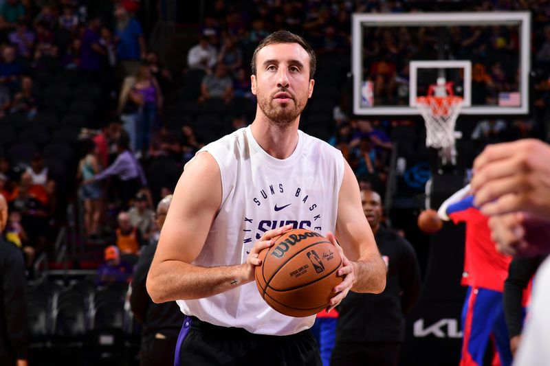 PHOENIX, AZ - OCTOBER 11: Frank Kaminsky #33 shoots the ball before the game on October 11, 2024 at Footprint Center in Phoenix, Arizona. NOTE TO USER: User expressly acknowledges and agrees that, by downloading and or using this photograph, user is consenting to the terms and conditions of the Getty Images License Agreement. Mandatory Copyright Notice: Copyright 2024 NBAE (Photo by Kate Frese/NBAE via Getty Images)