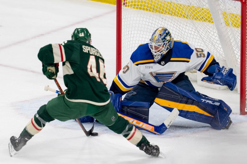 Apr 8, 2023; Saint Paul, Minnesota, USA; Minnesota Wild defenseman Jared Spurgeon (46) scores on St. Louis Blues goaltender Jordan Binnington (50) in the second period at Xcel Energy Center. Mandatory Credit: Matt Blewett-USA TODAY Sports