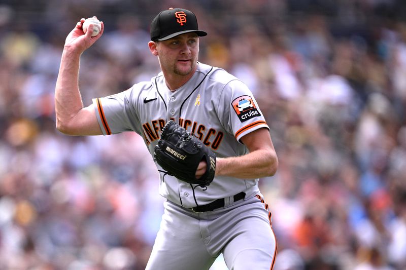 Sep 3, 2023; San Diego, California, USA; San Francisco Giants relief pitcher Keaton Winn (67) throws to first base on a sacrifice bunt during the fourth inning against the San Diego Padres at Petco Park. Mandatory Credit: Orlando Ramirez-USA TODAY Sports