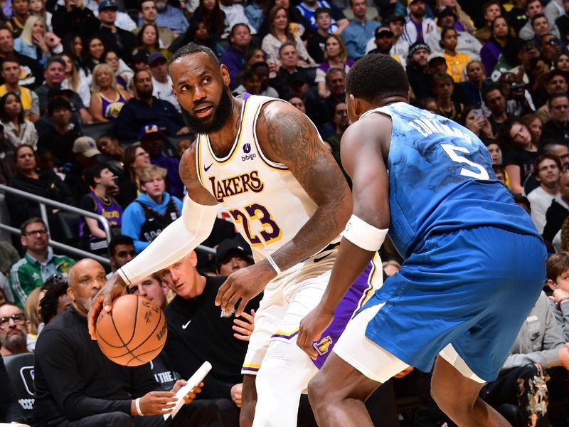 LOS ANGELES, CA - MARCH 10: LeBron James #23 of the Los Angeles Lakers dribbles the ball during the game against the Minnesota Timberwolves on March 10, 2024 at Crypto.Com Arena in Los Angeles, California. NOTE TO USER: User expressly acknowledges and agrees that, by downloading and/or using this Photograph, user is consenting to the terms and conditions of the Getty Images License Agreement. Mandatory Copyright Notice: Copyright 2024 NBAE (Photo by Adam Pantozzi/NBAE via Getty Images)