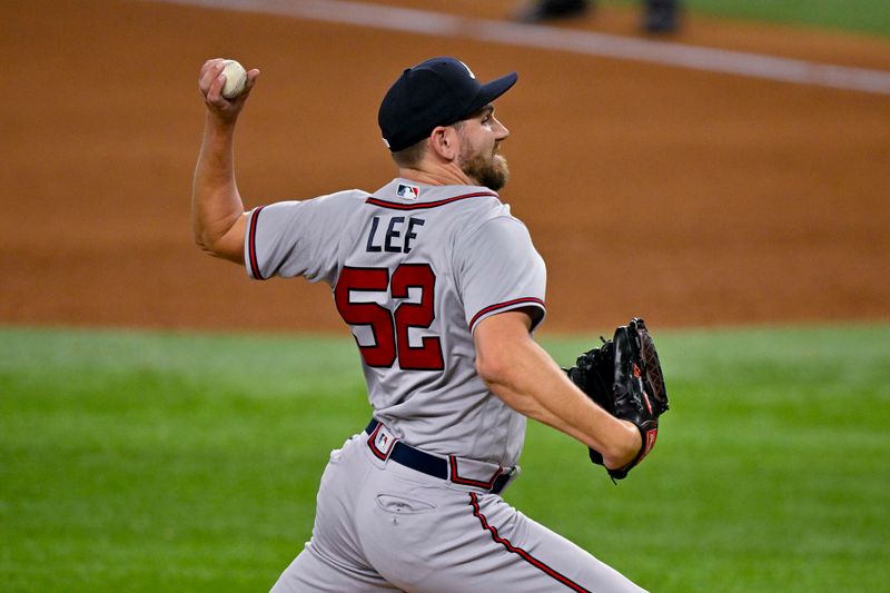 May 16, 2023; Arlington, Texas, USA; Atlanta Braves relief pitcher Dylan Lee (52) pitches against the Atlanta Braves during the sixth inning at Globe Life Field. Mandatory Credit: Jerome Miron-USA TODAY Sports