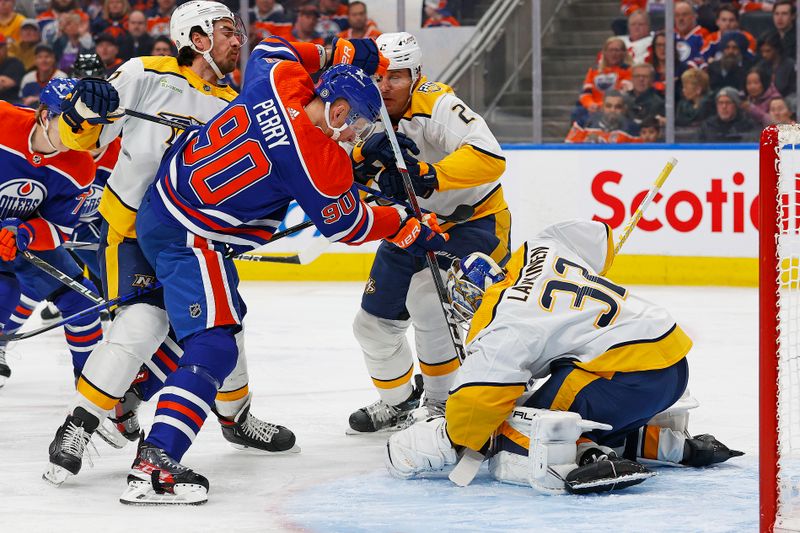 Jan 27, 2024; Edmonton, Alberta, CAN; Edmonton Oilers forward Corey Perry (90) goes for the puck in front of Nashville Predators goaltender Kevin Lankinen (32) during the first period at Rogers Place. Mandatory Credit: Perry Nelson-USA TODAY Sports