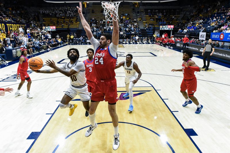 Feb 26, 2025; Berkeley, California, USA; California Golden Bears guard Jovan Blacksher Jr. (10) attempts a layup against SMU Mustangs center Samet Yiğitoğlu (24) in the second half at Haas Pavilion. Mandatory Credit: Eakin Howard-Imagn Images