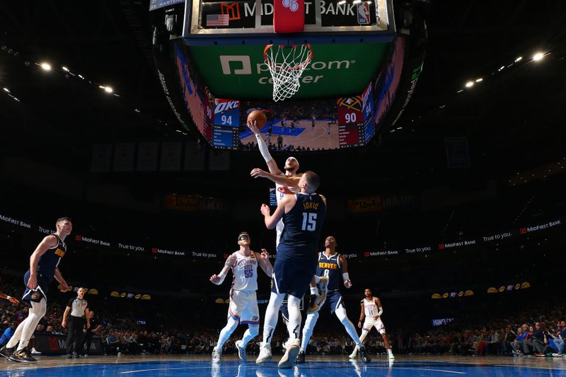 OKLAHOMA CITY, OK - MARCH 10: Alex Caruso #9 of the Oklahoma City Thunder drives to the basket during the game against the Denver Nuggets on March 10, 2025 at Paycom Center in Oklahoma City, Oklahoma. NOTE TO USER: User expressly acknowledges and agrees that, by downloading and or using this photograph, User is consenting to the terms and conditions of the Getty Images License Agreement. Mandatory Copyright Notice: Copyright 2025 NBAE(Photo by Zach Beeker/NBAE via Getty Images)