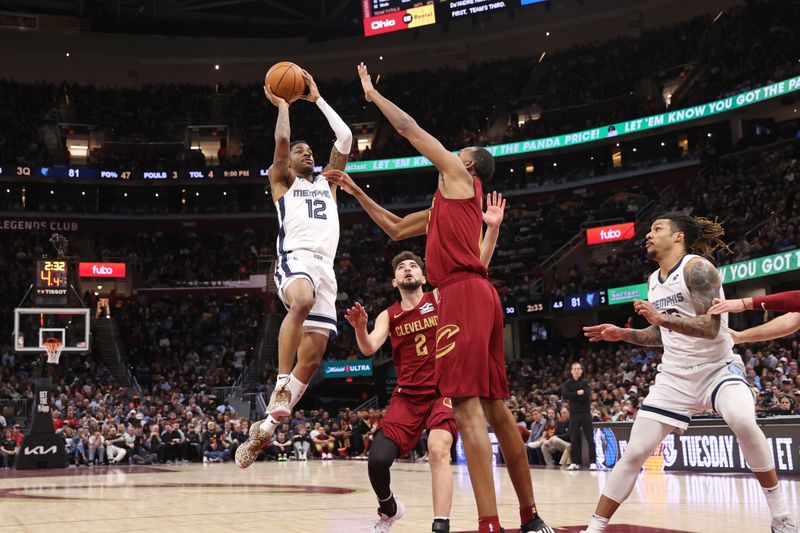 CLEVELAND, OH - FEBRUARY 23: Ja Morant #12 of the Memphis Grizzlies drives to the basket during the game against the Cleveland Cavaliers on February 23, 2025 at Rocket Arena in Cleveland, Ohio. NOTE TO USER: User expressly acknowledges and agrees that, by downloading and/or using this Photograph, user is consenting to the terms and conditions of the Getty Images License Agreement. Mandatory Copyright Notice: Copyright 2025 NBAE (Photo by Joe Murphy/NBAE via Getty Images)