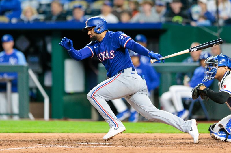 May 4, 2024; Kansas City, Missouri, USA; Texas Rangers first base Ezequiel Duran (20) at bat during the ninth inning against the Kansas City Royals at Kauffman Stadium. Mandatory Credit: William Purnell-USA TODAY Sports