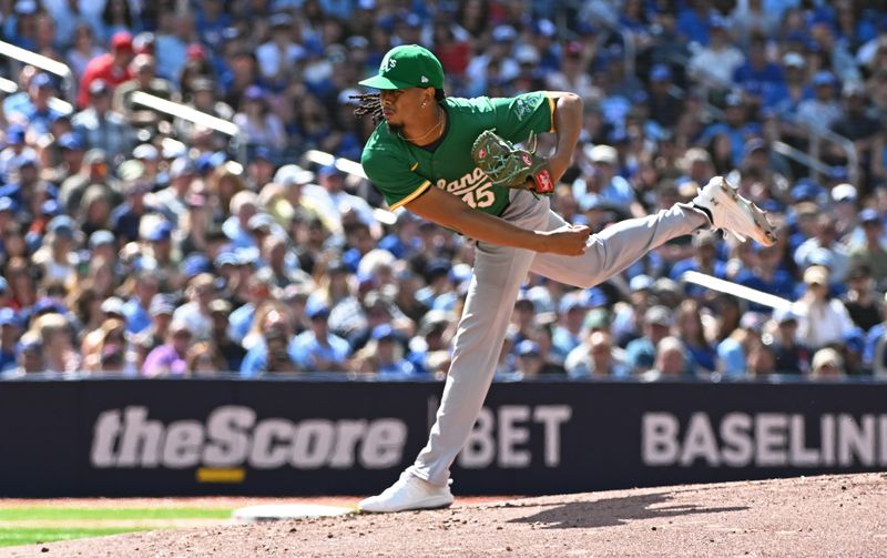 Aug 10, 2024; Toronto, Ontario, CAN;  Oakland Athletics pitcher Osvaldo Bido (45) pitches in the second inning against the Toronto Blue Jays at Rogers Centre. Mandatory Credit: Gerry Angus-USA TODAY Sports