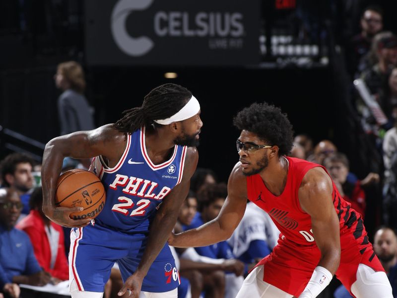 PORTLAND, OR - JANUARY 29: Patrick Beverley #22 of the Philadelphia 76ers handles the ball against Scoot Henderson #00 of the Portland Trail Blazers during the game on January 29, 2024 at the Moda Center Arena in Portland, Oregon. NOTE TO USER: User expressly acknowledges and agrees that, by downloading and or using this photograph, user is consenting to the terms and conditions of the Getty Images License Agreement. Mandatory Copyright Notice: Copyright 2024 NBAE (Photo by Cameron Browne/NBAE via Getty Images)