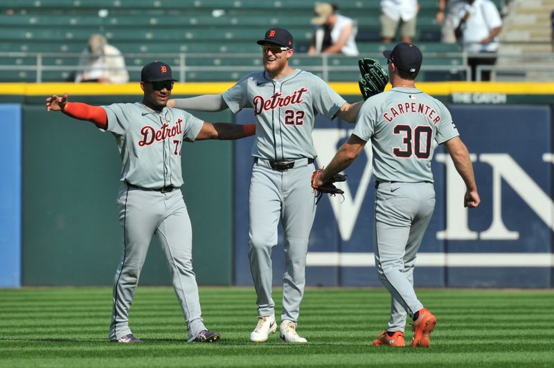 Aug 25, 2024; Chicago, Illinois, USA; The Detroit Tigers celebrate after defeating the Chicago White Sox at Guaranteed Rate Field. Mandatory Credit: Patrick Gorski-USA TODAY Sports