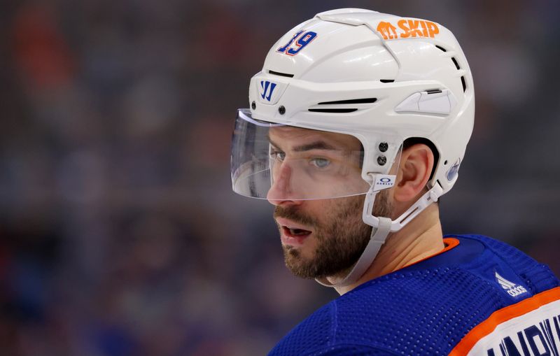 Mar 9, 2024; Buffalo, New York, USA;  Edmonton Oilers center Adam Henrique (19) during a stoppage in play against the Buffalo Sabres during the third period at KeyBank Center. Mandatory Credit: Timothy T. Ludwig-USA TODAY Sports