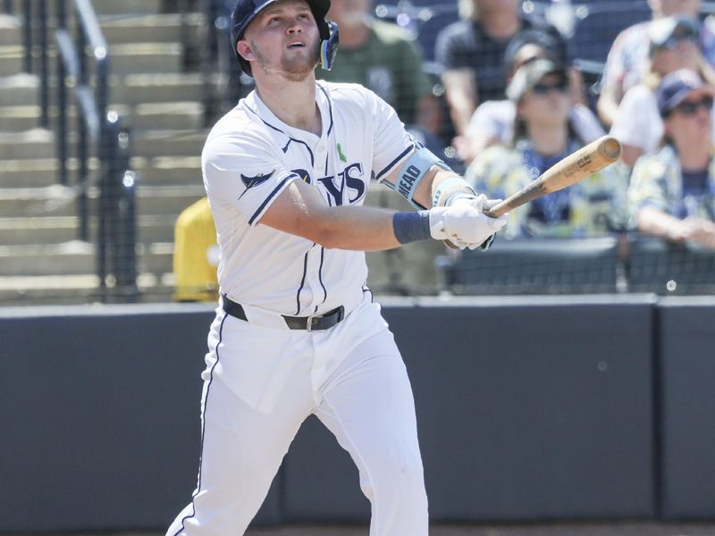 May 25, 2025; St. Petersburg, Florida, USA;  Tampa Bay Rays first base Curtis Mead (25) hits a 2-run home run during the seventh inning against the Toronto Blue Jays at George M. Steinbrenner Field. Mandatory Credit: Kim Klement Neitzel-Imagn Images