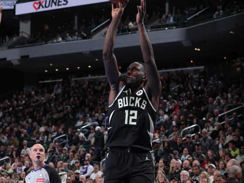 MILWAUKEE, WI - NOVEMBER 22:  Taurean Prince #12 of the Milwaukee Bucks shoots a three point basket during the game against the Indiana Pacers during a Emirates NBA Cup on November 22, 2024 at Fiserv Forum Center in Milwaukee, Wisconsin. NOTE TO USER: User expressly acknowledges and agrees that, by downloading and or using this Photograph, user is consenting to the terms and conditions of the Getty Images License Agreement. Mandatory Copyright Notice: Copyright 2024 NBAE (Photo by Gary Dineen/NBAE via Getty Images).