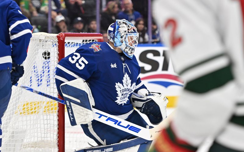 Oct 14, 2023; Toronto, Ontario, CAN;   Toronto Maple Leafs goalie Ilya Samsonov (35) is beaten for a goal by a shot from Minnesota Wild forward Matt Boldy (12, right) in the second period at Scotiabank Arena. Mandatory Credit: Dan Hamilton-USA TODAY Sports