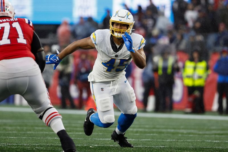 Los Angeles Chargers linebacker Tuli Tuipulotu during an NFL football game against the New England Patriots at Gillette Stadium, Sunday, Dec. 3, 2023 in Foxborough, Mass. (Winslow Townson/AP Images for Panini)