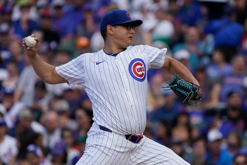 Jun 23, 2024; Chicago, Illinois, USA; Chicago Cubs pitcher Javier Assad (72) throws the ball against the New York Mets during the first inning at Wrigley Field. Mandatory Credit: David Banks-USA TODAY Sports