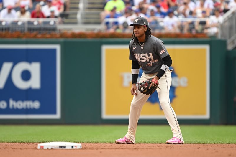 Aug 31, 2024; Washington, District of Columbia, USA; Washington Nationals shortstop CJ Abrams (5) waits for a play to start at second base against the Chicago Cubs during the second inning at Nationals Park. Mandatory Credit: Rafael Suanes-USA TODAY Sports