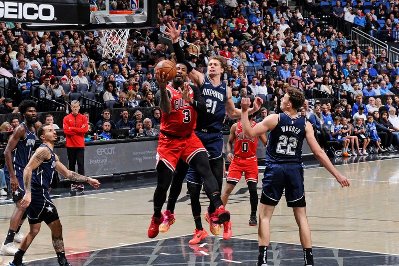 ORLANDO, FL - FEBRUARY 10: Andre Drummond #3 of the Chicago Bulls grabs a rebound during the game against the Orlando Magic on February 10, 2024 at the Kia Center in Orlando, Florida. NOTE TO USER: User expressly acknowledges and agrees that, by downloading and or using this photograph, User is consenting to the terms and conditions of the Getty Images License Agreement. Mandatory Copyright Notice: Copyright 2024 NBAE (Photo by Fernando Medina/NBAE via Getty Images)